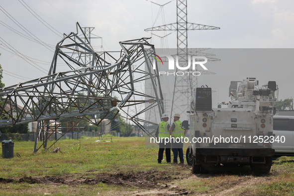 A mangled transmission tower is being seen at the intersection of Gardendale Dr. and Antoine Dr. as crews throughout Houston are working to...