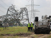 A mangled transmission tower is being seen at the intersection of Gardendale Dr. and Antoine Dr. as crews throughout Houston are working to...