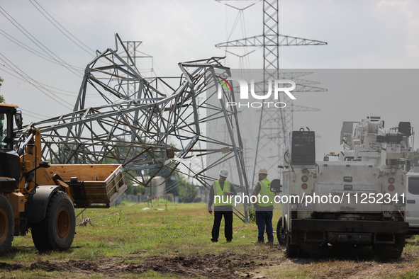 A mangled transmission tower is being seen at the intersection of Gardendale Dr. and Antoine Dr. as crews throughout Houston are working to...