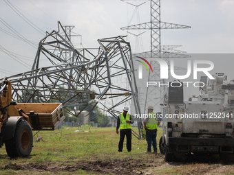 A mangled transmission tower is being seen at the intersection of Gardendale Dr. and Antoine Dr. as crews throughout Houston are working to...