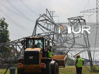 A mangled transmission tower is being seen at the intersection of Gardendale Dr. and Antoine Dr. as crews throughout Houston are working to...