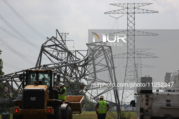 A mangled transmission tower is being seen at the intersection of Gardendale Dr. and Antoine Dr. as crews throughout Houston are working to...