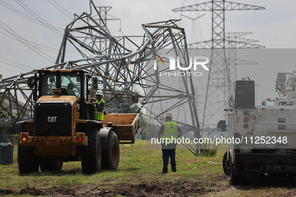 A mangled transmission tower is being seen at the intersection of Gardendale Dr. and Antoine Dr. as crews throughout Houston are working to...