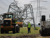 A mangled transmission tower is being seen at the intersection of Gardendale Dr. and Antoine Dr. as crews throughout Houston are working to...