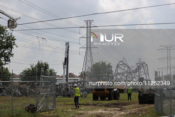 A mangled transmission tower is being seen at the intersection of Gardendale Dr. and Antoine Dr. as crews throughout Houston are working to...