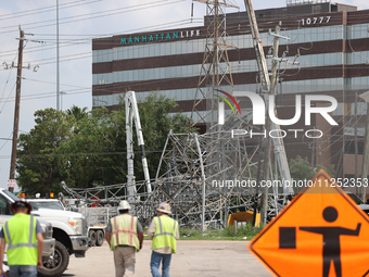 Crews are working tirelessly to fix a series of destroyed transmission towers near US 290 and 34th St. in Houston, Texas. (