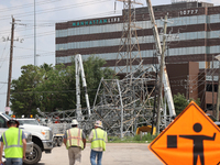 Crews are working tirelessly to fix a series of destroyed transmission towers near US 290 and 34th St. in Houston, Texas. (