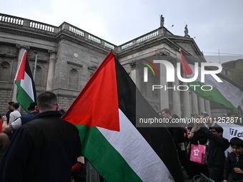 DUBLIN, IRELAND - MAY 18:
Pro-Palestinian activists from the Ireland Palestine Solidarity Campaign, supported by members of left-wing partie...