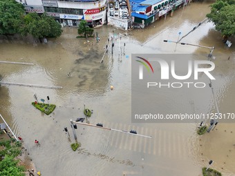 A flooded road is being seen after heavy rain in Nanning, Guangxi province, China, on May 19, 2024. (