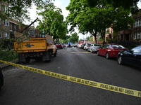 Police tape is blocking off traffic at the crime scene. A 35-year-old male victim is being shot and is in critical condition in Chicago, Ill...