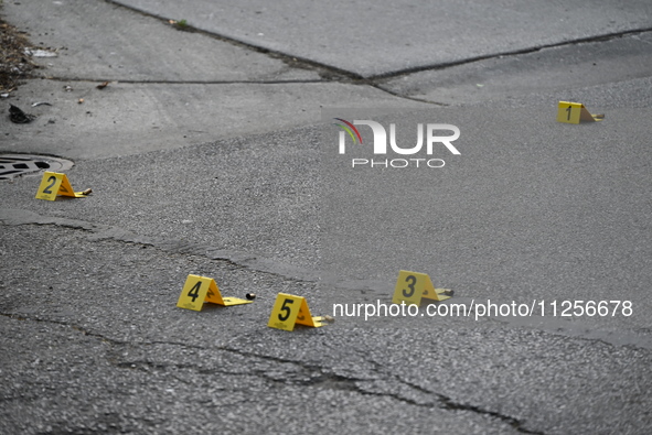 Evidence markers are showing where shell casings are being found at the crime scene. A 15-year-old male is being critically wounded in a sho...