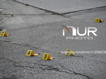 Evidence markers are showing where shell casings are being found at the crime scene. A 15-year-old male is being critically wounded in a sho...