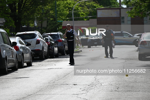 Police officers are at the scene and are recovering shell casings at the crime scene. A 29-year-old male is critically wounded after being s...