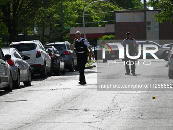 Police officers are at the scene and are recovering shell casings at the crime scene. A 29-year-old male is critically wounded after being s...