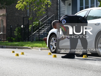 A police officer is at the scene, and shell casings are being recovered at the crime scene. A 29-year-old male is being critically wounded a...