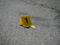 A shell casing is being recovered at the crime scene. A 29-year-old male is being critically wounded after being shot multiple times in a sh...