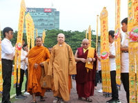 Monks are walking into the 2024 Vesak Day commemoration event organized by Buddhists and the Medan City Government, in Medan, North Sumatra,...