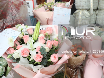 Flowers are becoming popular at a florist in Funing county, Yancheng city, East China's Jiangsu province, on May 20, 2024. (