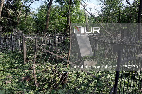 A local cemetery is being damaged by Russian shelling in Kharkiv, Ukraine, on May 19, 2024. NO USE RUSSIA. NO USE BELARUS. 