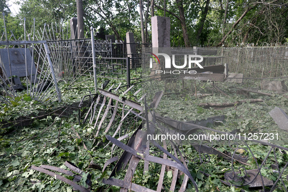 A local cemetery is being damaged by Russian shelling in Kharkiv, Ukraine, on May 19, 2024. NO USE RUSSIA. NO USE BELARUS. 