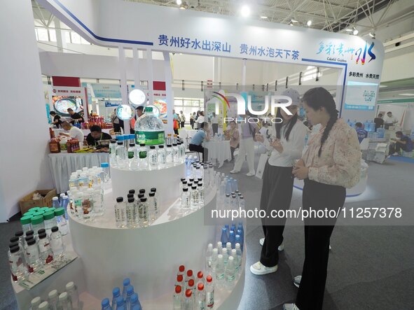 Visitors are visiting the green food exhibition area of the 32nd China International Health Industry Expo in Beijing, China, on May 20, 2024...