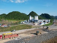 Workers are working at the construction site of a highway in Jiangbian village, Liuzhou city, South China's Guangxi Zhuang Autonomous region...