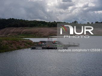 A view of the Sau reservoir at 20%, after a few weeks of rain that are softening the effects of the drought in Catalonia, in Osona, Spain, o...