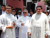 Priests are taking part in the traditional downing of the Virgen de Ocotlan. In this procession, the virgin is visiting different emblematic...