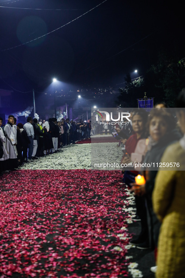 A carpet of sawdust is being seen during the traditional downing of the Virgen de Ocotlan. In this procession, the virgin is visiting differ...