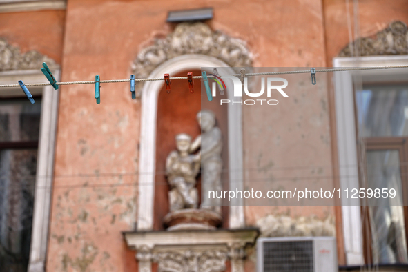 A rope with clothespins is being seen in a courtyard in the historic city center in Odesa, Ukraine, on May 20, 2024. NO USE RUSSIA. NO USE B...