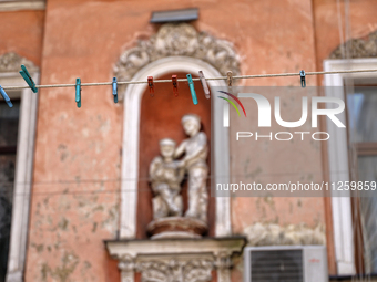 A rope with clothespins is being seen in a courtyard in the historic city center in Odesa, Ukraine, on May 20, 2024. NO USE RUSSIA. NO USE B...