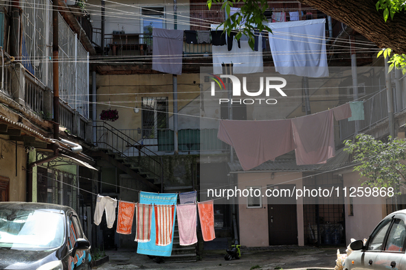 Laundry is drying on ropes in a courtyard in the historic city center in Odesa, Ukraine, on May 20, 2024. NO USE RUSSIA. NO USE BELARUS. 