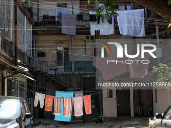 Laundry is drying on ropes in a courtyard in the historic city center in Odesa, Ukraine, on May 20, 2024. NO USE RUSSIA. NO USE BELARUS. (