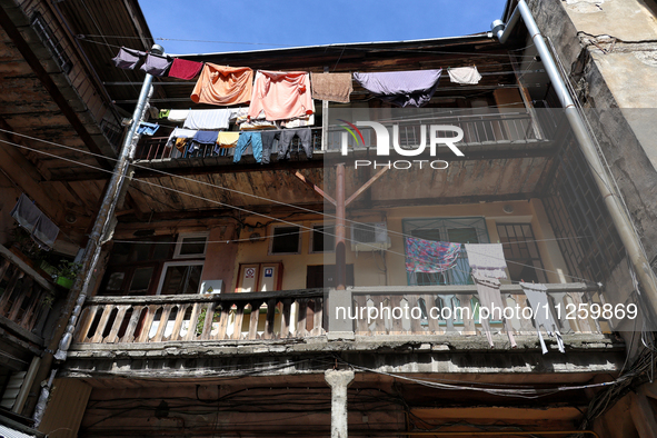 Laundry is drying on ropes in a courtyard in the historic city center in Odesa, Ukraine, on May 20, 2024. NO USE RUSSIA. NO USE BELARUS. 