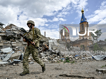 Fighters of the 53rd Battalion of the 141st Separate Infantry Brigade are serving in the Zaporizhzhia region, Ukraine, on May 20, 2024. NO U...