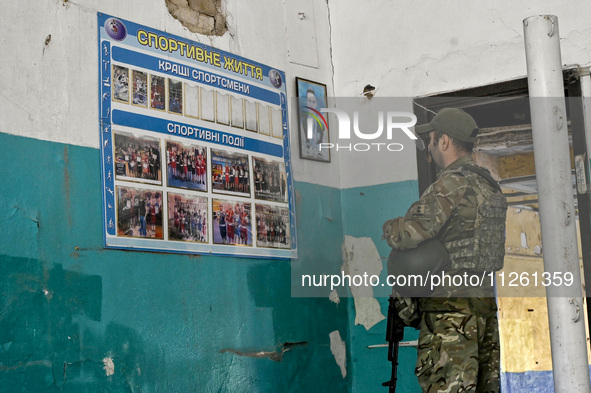 A fighter of the 53rd Battalion of the 141st Separate Infantry Brigade is serving in the Zaporizhzhia region, Ukraine, on May 20, 2024. NO U...