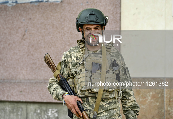 A fighter of the 53rd Battalion of the 141st Separate Infantry Brigade is serving in the Zaporizhzhia region, Ukraine, on May 20, 2024. NO U...