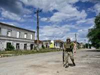 A fighter of the 53rd Battalion of the 141st Separate Infantry Brigade is serving in the Zaporizhzhia region, Ukraine, on May 20, 2024. NO U...