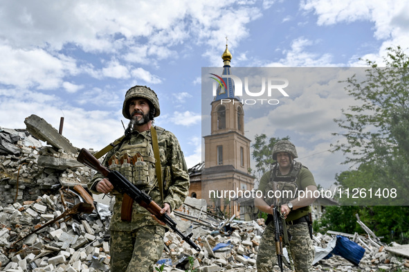 Fighters of the 53rd Battalion of the 141st Separate Infantry Brigade are serving in the Zaporizhzhia region, Ukraine, on May 20, 2024. NO U...