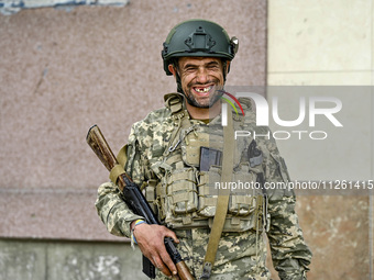 A fighter of the 53rd Battalion of the 141st Separate Infantry Brigade is serving in the Zaporizhzhia region, Ukraine, on May 20, 2024. NO U...