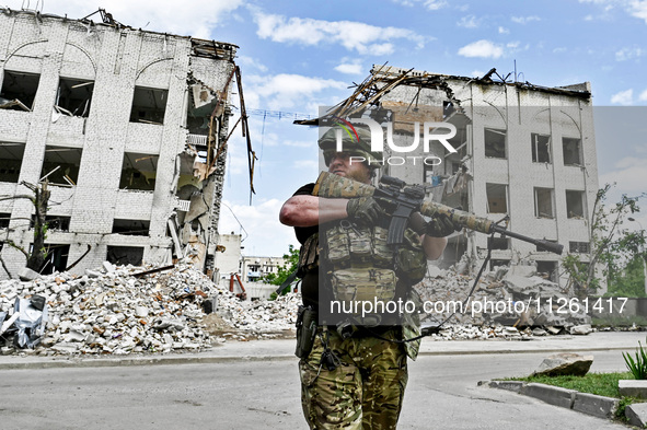 A fighter of the 53rd Battalion of the 141st Separate Infantry Brigade is serving in the Zaporizhzhia region, Ukraine, on May 20, 2024. NO U...