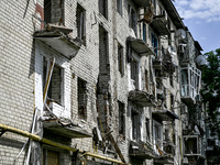 A five-story building is being damaged by Russian shelling in Orikhiv, Zaporizhzhia region, Ukraine, on May 20, 2024. NO USE RUSSIA. NO USE...