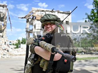 A fighter of the 53rd Battalion of the 141st Separate Infantry Brigade is serving in the Zaporizhzhia region, Ukraine, on May 20, 2024. NO U...