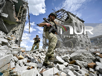 A fighter of the 53rd Battalion of the 141st Separate Infantry Brigade is serving in the Zaporizhzhia region, Ukraine, on May 20, 2024. NO U...