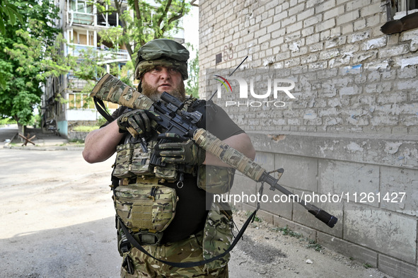 A fighter of the 53rd Battalion of the 141st Separate Infantry Brigade is serving in the Zaporizhzhia region, Ukraine, on May 20, 2024. NO U...