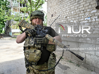 A fighter of the 53rd Battalion of the 141st Separate Infantry Brigade is serving in the Zaporizhzhia region, Ukraine, on May 20, 2024. NO U...