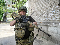 A fighter of the 53rd Battalion of the 141st Separate Infantry Brigade is serving in the Zaporizhzhia region, Ukraine, on May 20, 2024. NO U...