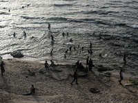 Palestinians are gathering on the beach in Deir el-Balah in the central Gaza Strip, on May 21, 2024, amid the ongoing conflict between Israe...