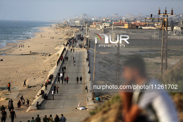 Palestinians are gathering in the hope of obtaining aid delivered into Gaza through a U.S.-built pier, amid the ongoing conflict between Isr...