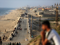 Palestinians are gathering in the hope of obtaining aid delivered into Gaza through a U.S.-built pier, amid the ongoing conflict between Isr...